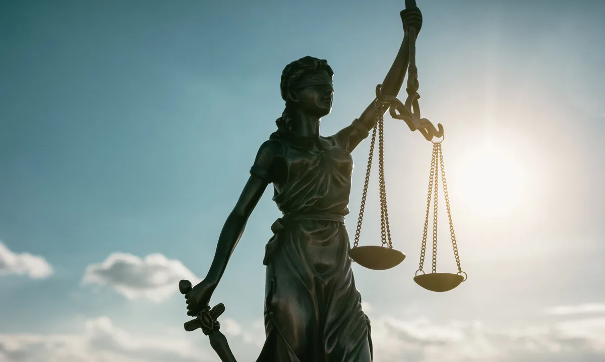 Egyptian divorce lawyer reviewing evidence and court strategy for foreign clients