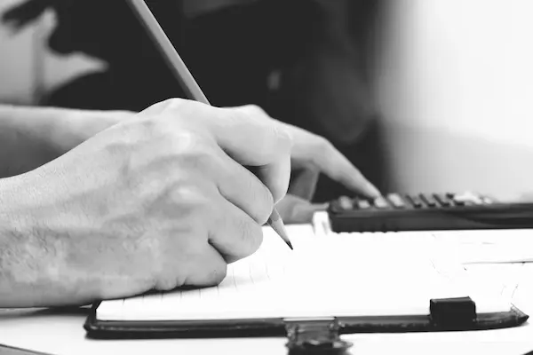 Foreign property owner reviewing contracts, payment records and developer correspondence before taking legal action in a property dispute in Egypt