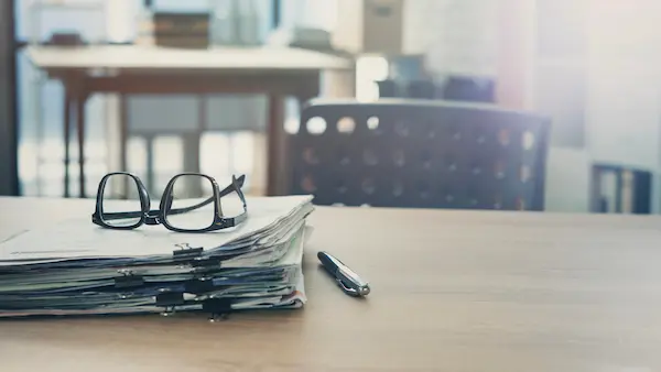 Foreign property owner reviewing an Egyptian property contract before signing, negotiation and bilingual legal redrafting